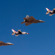 Illustration for article titled These Photos Of Thunderbirds F-16s Flying With F-22 Raptors Is A Whole Lot Of America